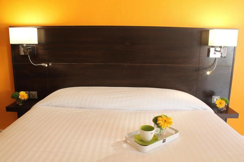 Centr'Hotel Маригот Екстериор снимка